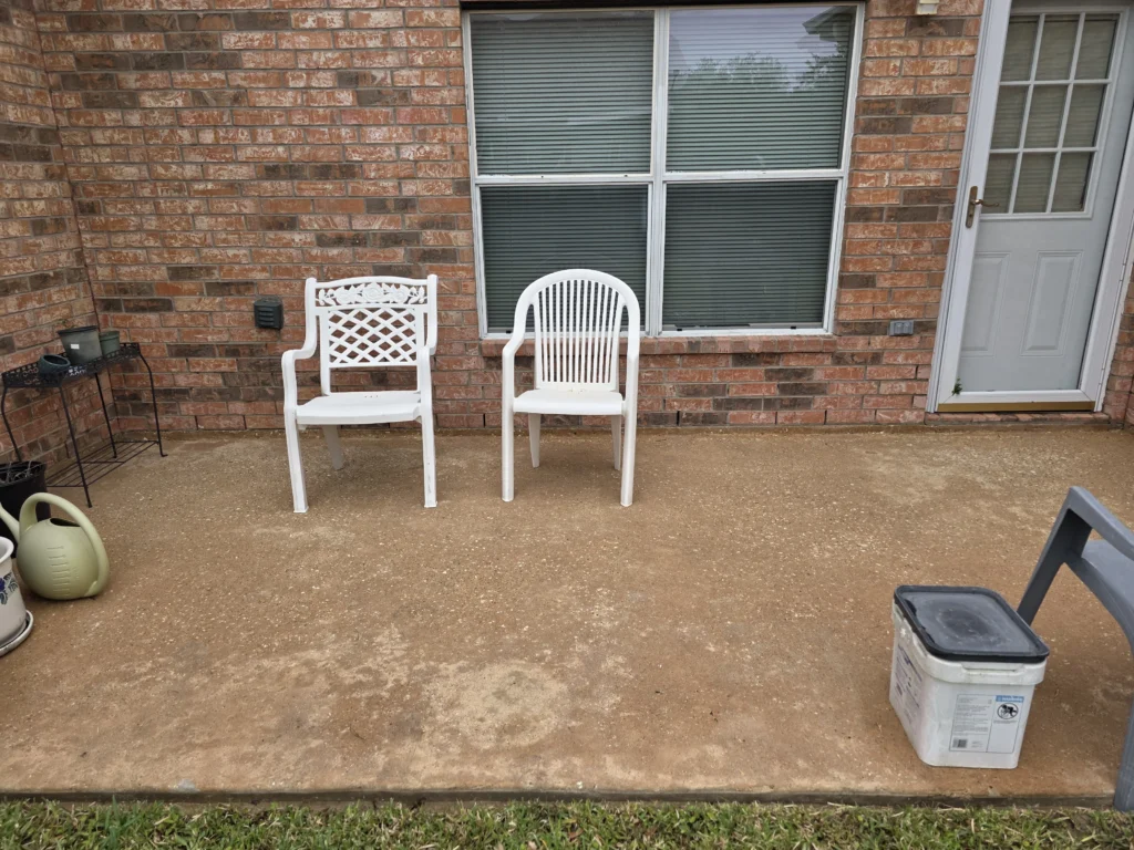 Dirty back patio before pressure washing in Tomball TX